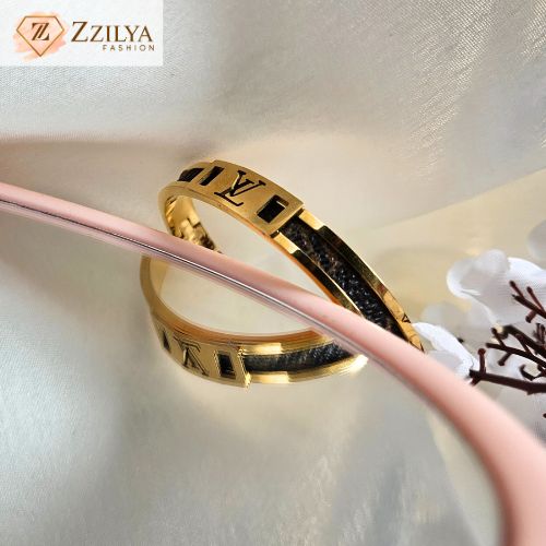 Trendy stackable bracelets for women – showcasing 2025 bracelet trends with mixed metals, charms, and layered designs by Zzilya