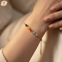 Colorful beaded bracelet on a wrist with a soft background by zzilya fashion
