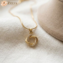 Zzilya Fashion golden anti-tarnish necklace featuring two interlocking circles—one smooth gold and one paved with cubic zirconia—on a premium snake chain.