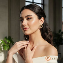 Elegant Interlocking Knot Stud Earrings in Gold Tone - Under ₹99