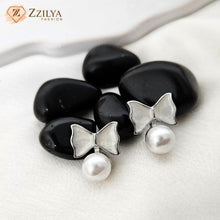 White Bow Pearl Earrings