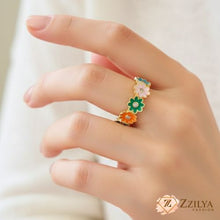 Close-up of a gold daisy flower ring, an ideal adjustable-size gift for her, packaged for spring and summer fashion collections.
