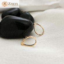 Oval Golden Stud earrings