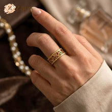 ZZILYA Fashion adjustable golden ring with celestial moon and star filigree cutouts on a white textured background.