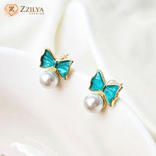 Pearl bow stud korean earrings