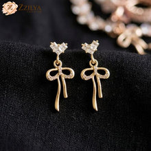 Golden Dangle Earrings
Great Quality, Unbeatable Price! under Rs 99 by zzilya fashion