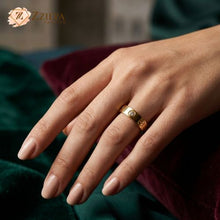 Golden cartier band ring on a hand with by zzilya fashion