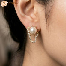 Pearl earring worn by a person by Zzilya fashion under rs 99
