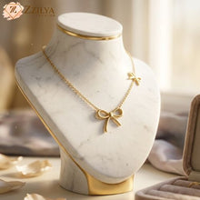Golden bow necklace by zzilya fashion