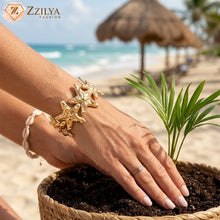 Golden hand Cuff by 'Zzilya Fashion' branding.