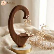 Wooden earring stand with bow-shaped earrings on a soft background by zzilya fashion
The Perfect Gift for Her (Girlfriend or Bestie!)
Everyday Pearl Perfection.