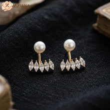 Korean pearl and marquee-cut stone 2-in-1 ear jacket earrings being worn, from Zzilya Fashion.