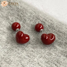 Add a touch of premium Korean style to your everyday look with ZZILYA FASHION's best-selling Red Heart Stud Earrings! These unique, double-sided 3D earrings feature a flawless, deep red high-gloss finish that oozes quality. Get this incredibly affordable, top-notch style for Under ₹99! It's the perfect, chic gift for your girlfriend or friend and ideal for casual and regular days. Shop this limited-stock offer only on zzilyafashion