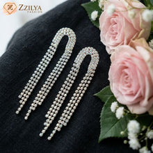 Zzilya Fashion Silver rhinestone long statement earrings for ₹99.
