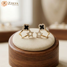 Star-shaped earrings on a wooden stand with a blurred background by Zzilya fashion