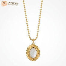 ZZILYA Fashion affordable high-quality jewelry: gold-toned anti-tarnish pendant necklace with matching earrings.
