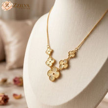Zzilya Fashion 18K gold-plated anti-tarnish necklace featuring a minimalist four-leaf clover pendant; styled for 2026 jewelry trends on a soft-focus aesthetic background.