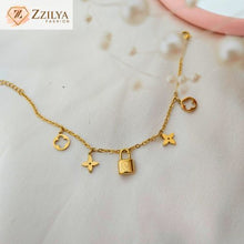 Premium Zzilya Fashion anti-tarnish charm bracelet with gold lock and floral motifs – hypoallergenic jewelry gift for women.