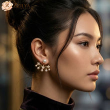 Close-up of a woman wearing pearl earrings with a blurred background by zzilya fashion